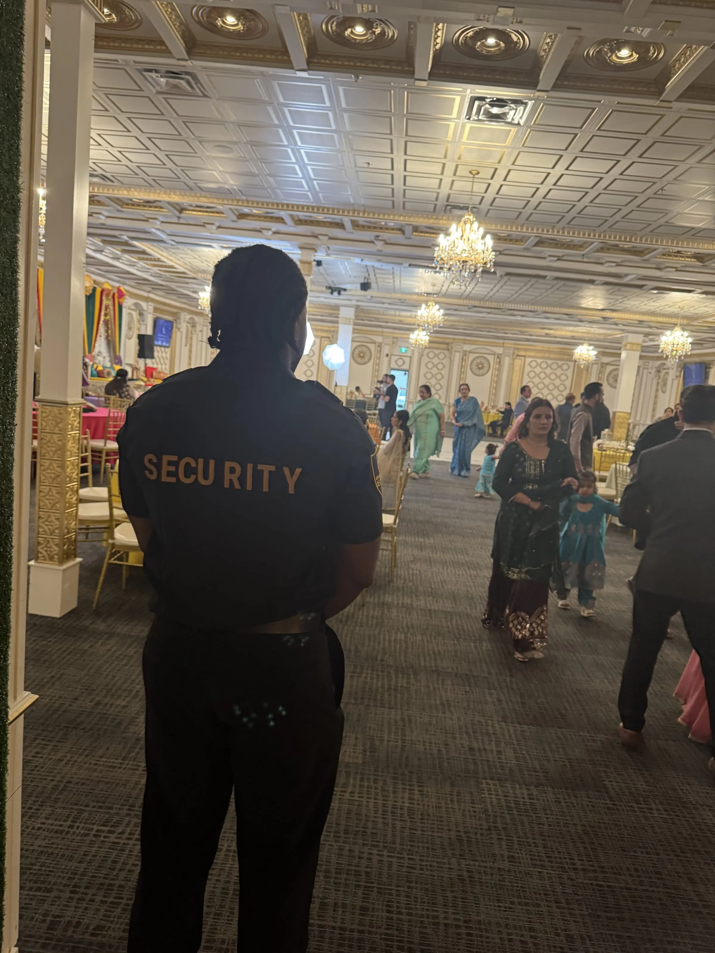 Guard Tower Security event guard supervising guests in a banquet hall