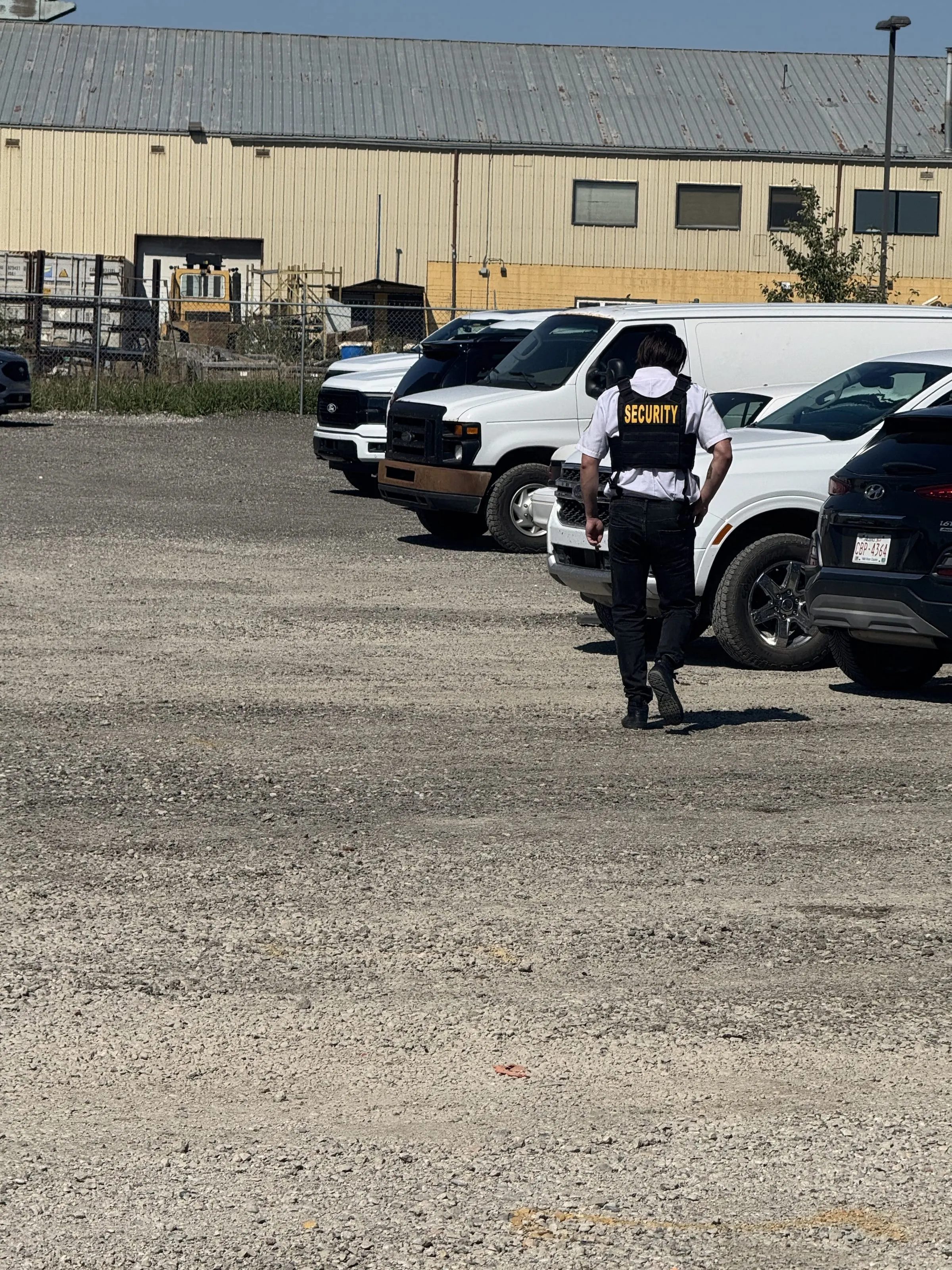 Guard Tower Security guard patrolling a Calgary truck yard