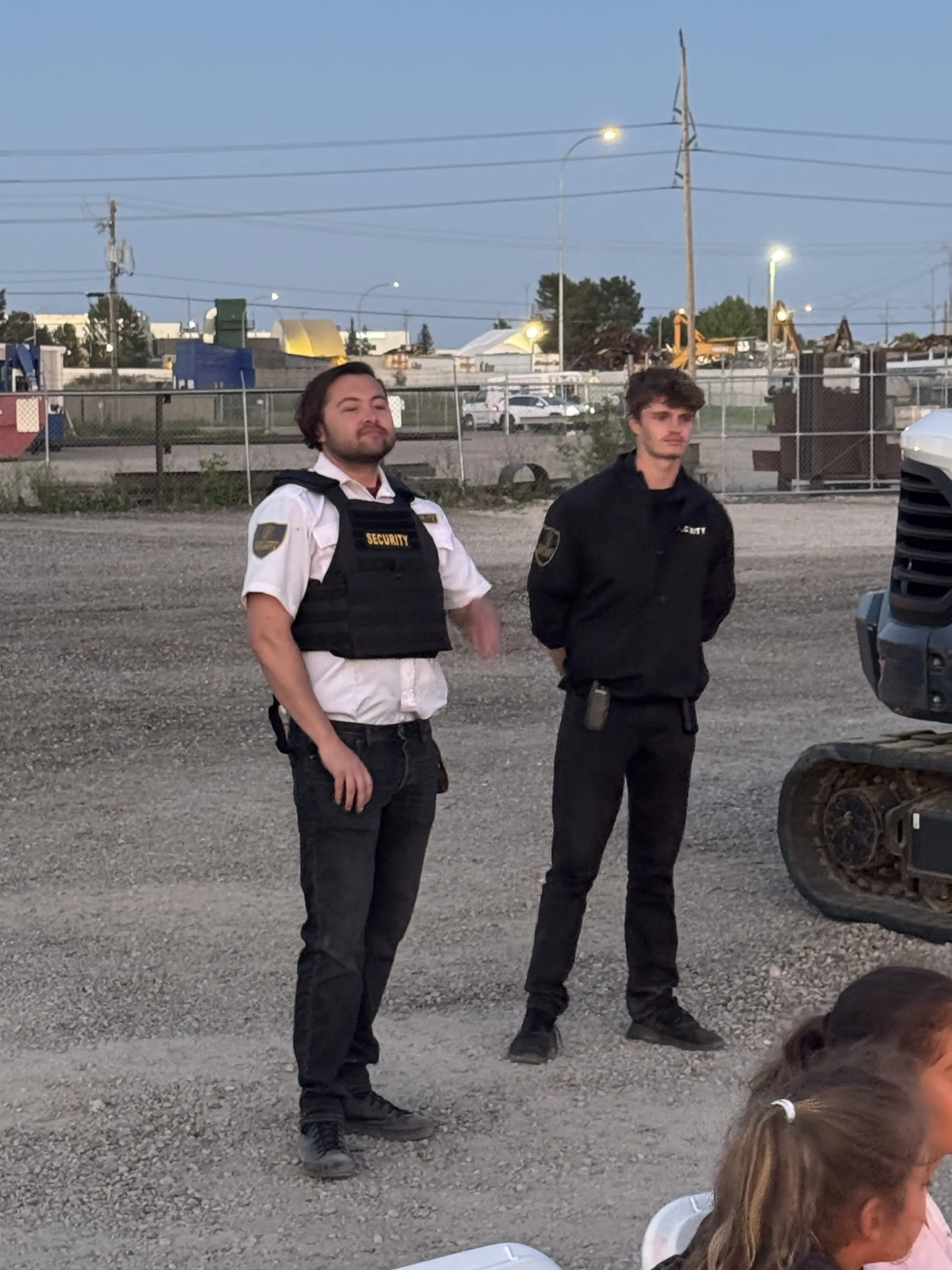 Guard Tower Security guards on evening site watch at a construction yard