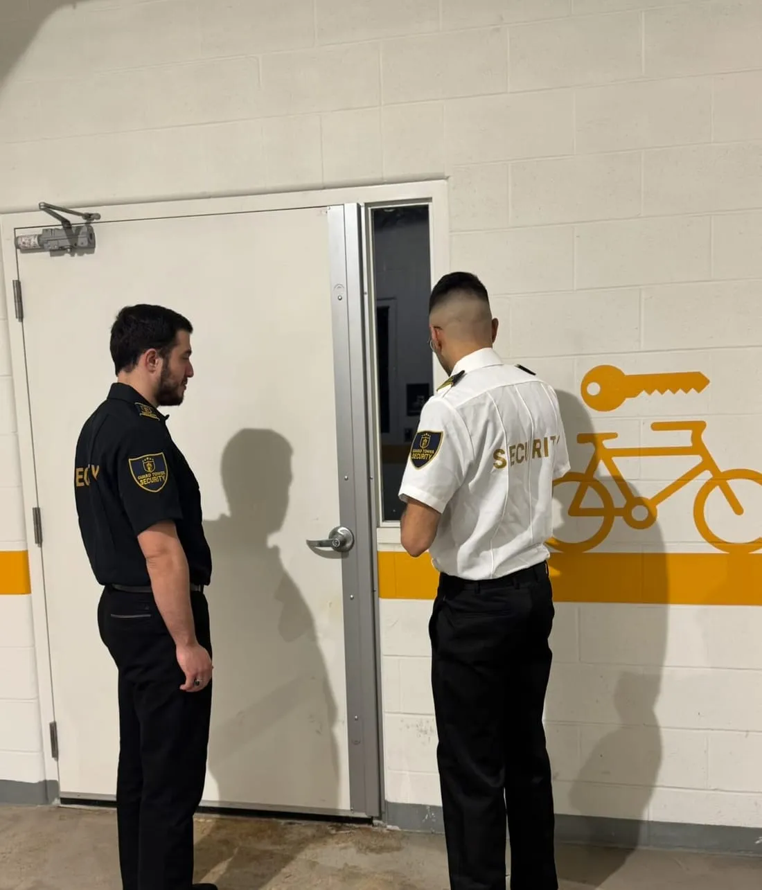 Guard Tower Security guards inspecting a condo bike storage room