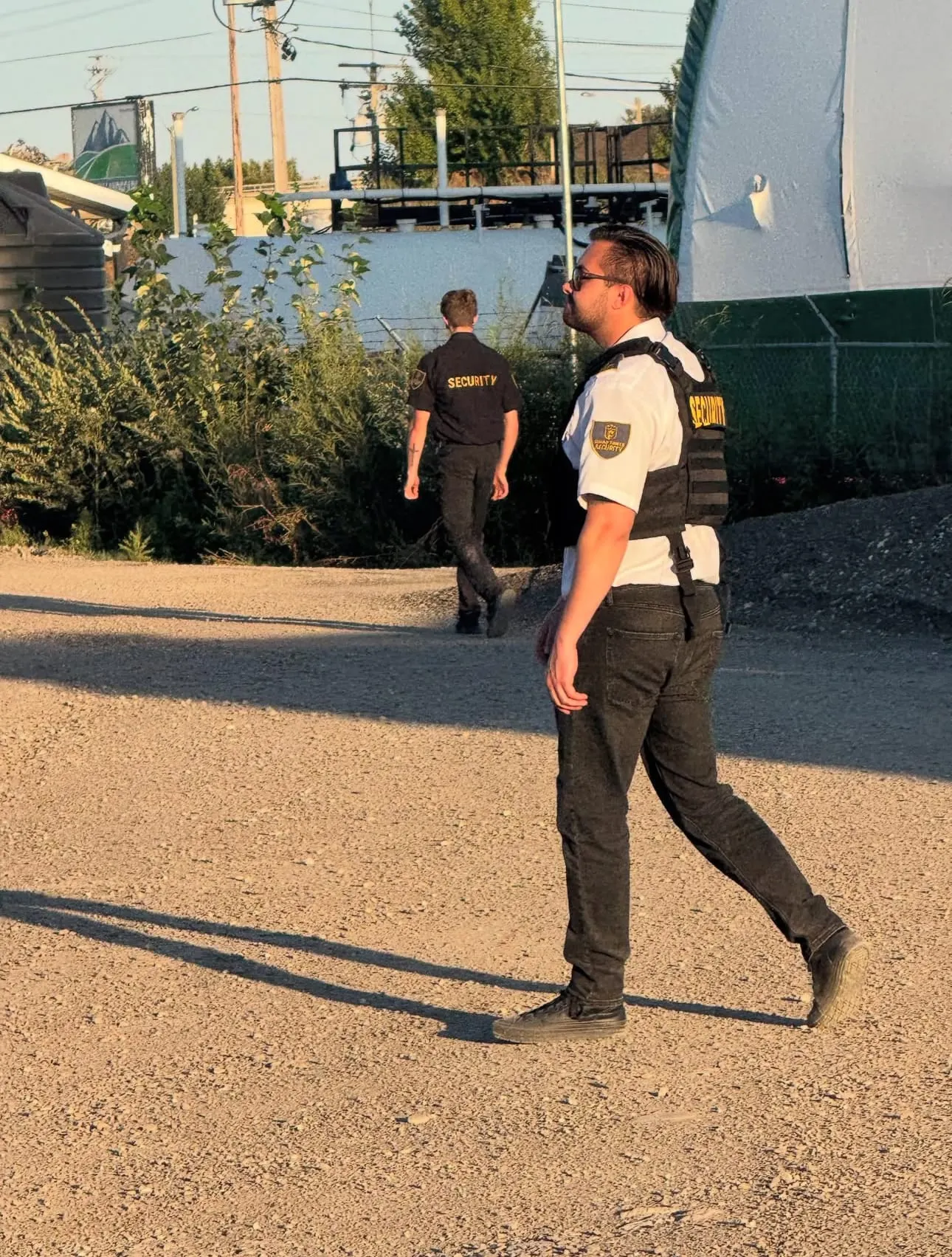 Guard Tower Security guards on perimeter patrol at a Calgary construction site