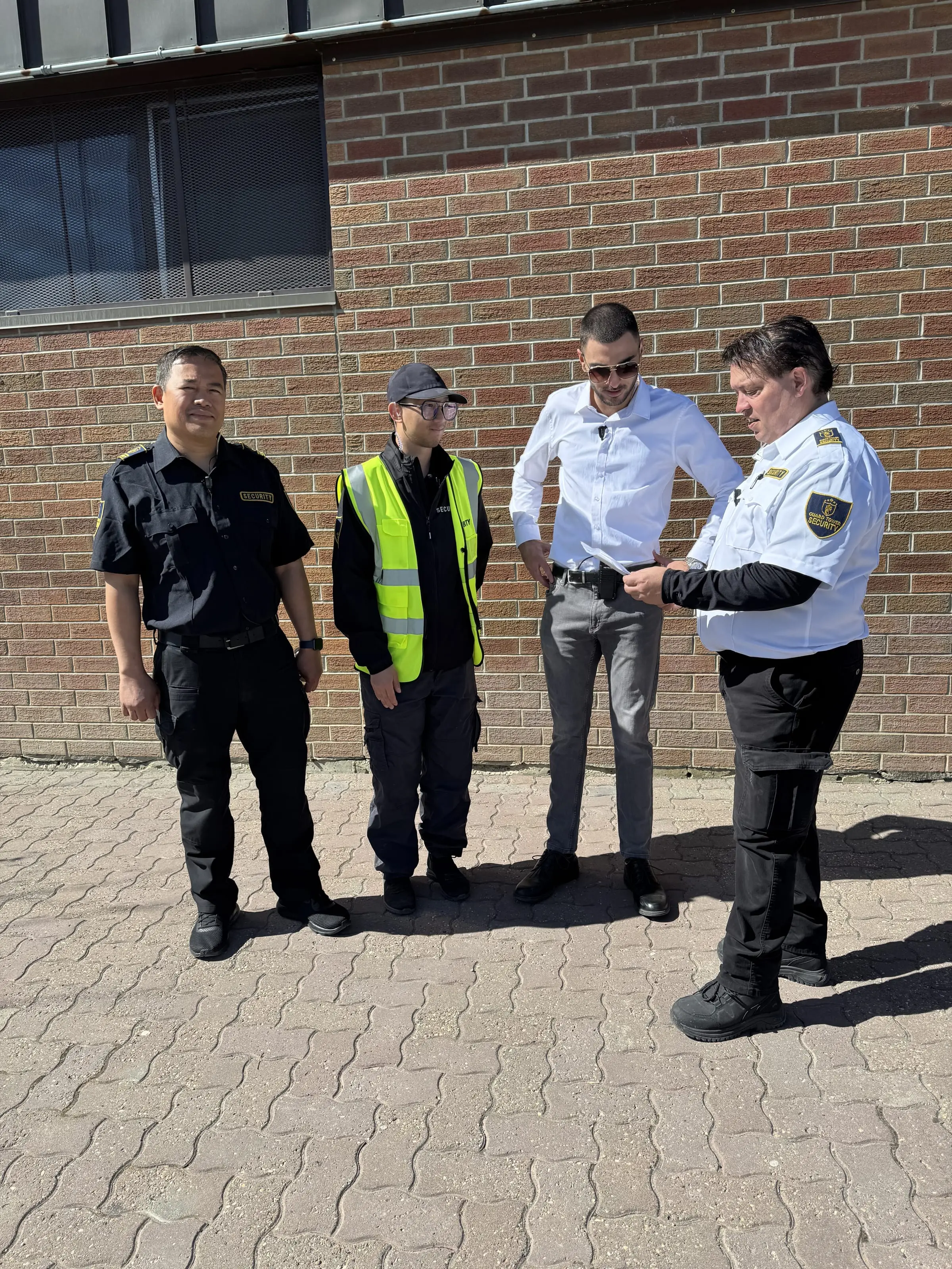Guard Tower Security team briefing on site before a shift