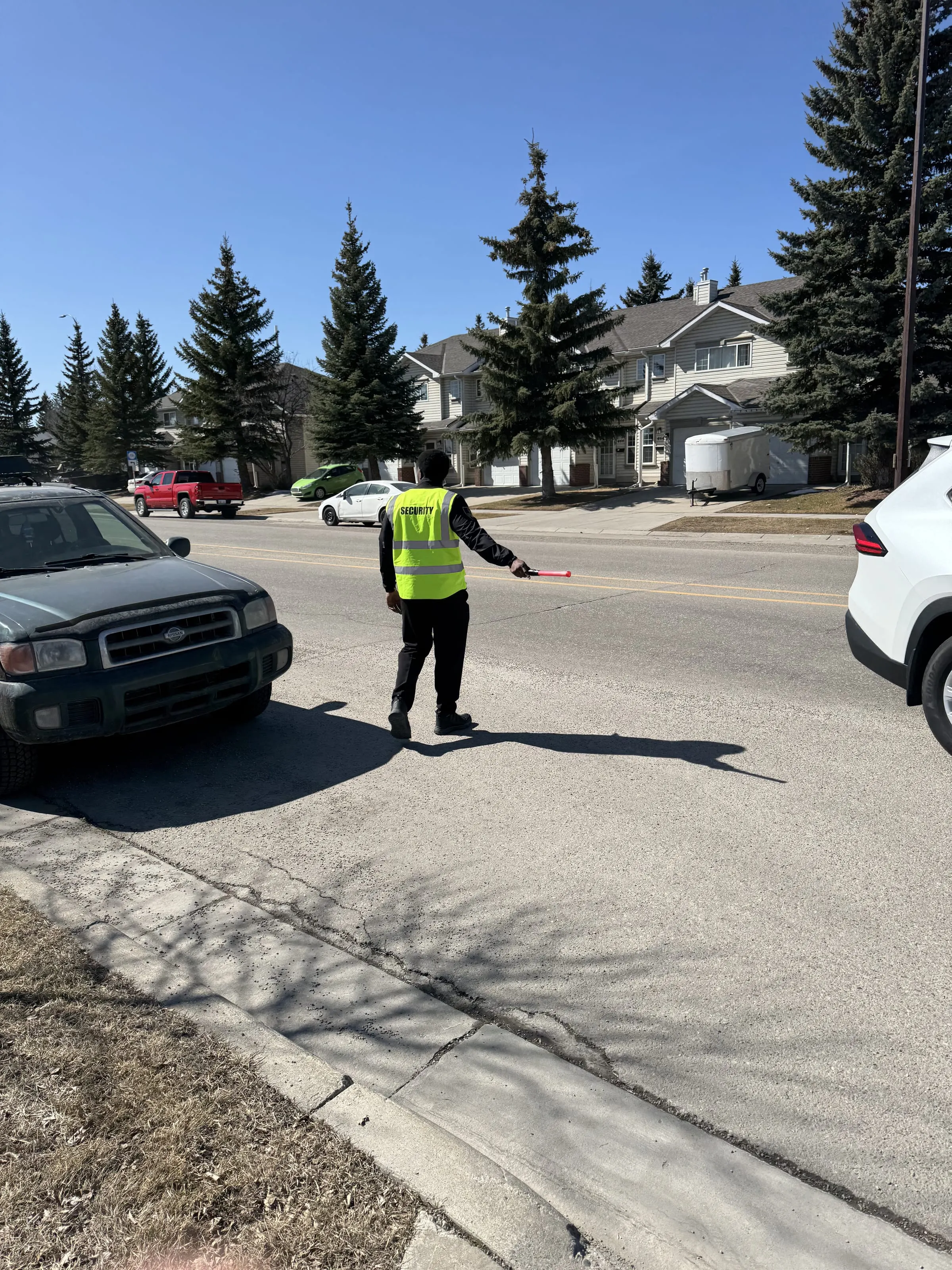 Guard Tower Security guard directing traffic on a residential street